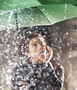 woman holding umbrella