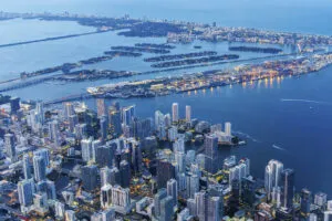 aerial view of miami skyline with skyscrapers downtown brickell and miami beach at night in miami, usa, north america