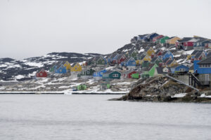 aerial shot of colorful houses in aasiaat city, greenland
