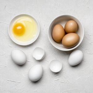 flat lay eggs stucco background