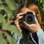 front view photographer with camera