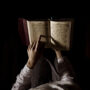 silhouette woman reading quran