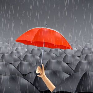 red umbrella under rain