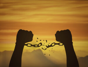 broken chains hands silhouette news