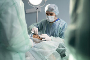 doctors operating room performing rhinoplasty