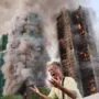 kebakaran besar menghanguskan sejumlah blok apartemen di kompleks permukiman di hong kong pada rabu 261120215 waktu setempat 1764160229696 169