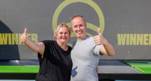 woman wins &pound;1m and gives neighbour &pound;5k for first ever family holiday abroad