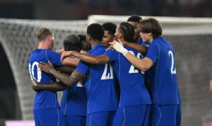 chelsea players celebrate vs milan