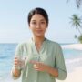 woman presenting seawater salt c… 202608081527
