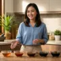 woman presenting soy sauce bowls 20261010160400